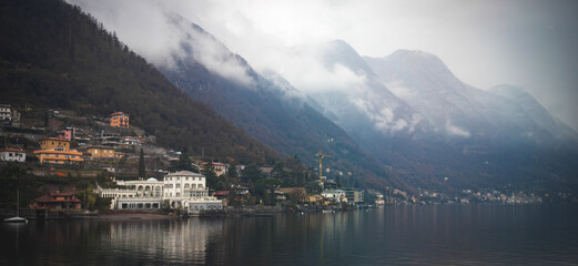 Vibrant buildings on the edge of the shore of Lake Como in Italy during the winter/spring months.
