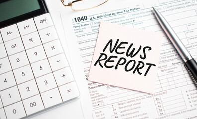 News Report with pen, calculator, glass and sticker. Tax report sign