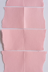 torn paper background in pink