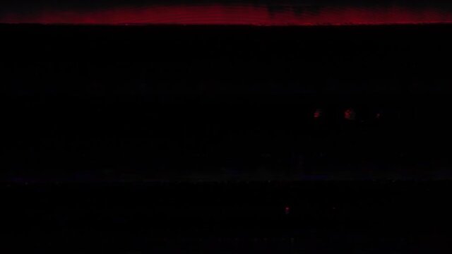 Seamless looping dark red tape glitches overlay. This overlay can be used in Screen Blending Mode to remove black background.