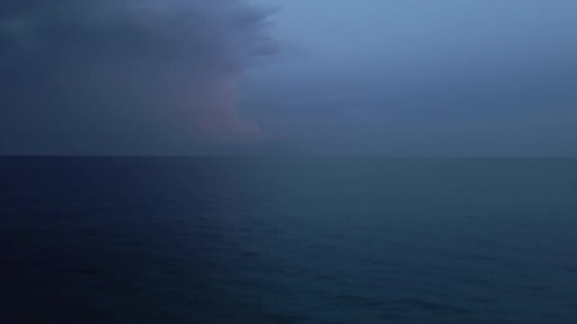 Surreal and ethereal blue on deep blue evening ocean background scene