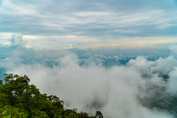 city on a hill covered with clouds from Telomoyo Mountain, Central Java, Indonesia