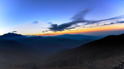 Dawn at Lungthang , Sikkim. Panoramic image of predwan light over Himalayan mountains at India China border.