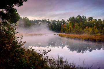 sunrise over the lake in the fall