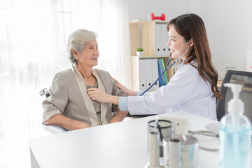 close up doctor, Asian doctor talk with old female patient about disease symptom, doctor use...