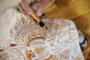 The process of making batik. batik is a handmade traditional art fashion from indonesia. - obrazy, fototapety, plakaty
