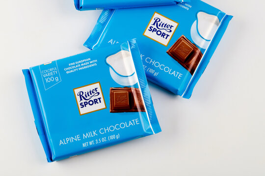 May 4, 2021. New York, US. Ritter Sport alpine milk chocolate bars on white background.