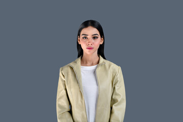 Young girl wearing jacket looking infront on grey background indian pakistani model