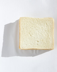 
A slice of bread on a white background