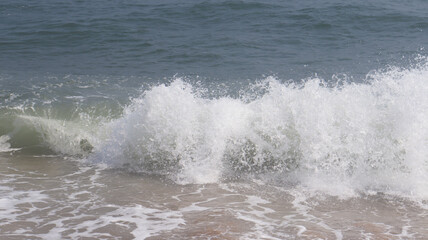 beautiful beach and sea waves water droplets