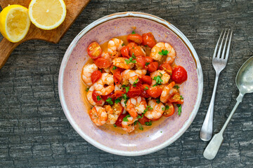 Jumbo king prawn with tomatoes and garlic
