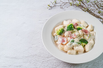 Korean food Spicy Stir-fried Carbonara tteokbokki dish on white plate