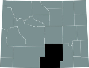 Black highlighted location map of the Carbon County inside gray administrative map of the Federal State of Wyoming, USA
