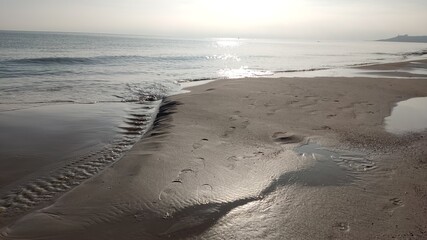 footprints on the beach