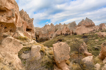 Fototapeta na wymiar Zelve Valley in Goreme, Cappadocia, Turkey. Cave town and houses at rock formations. 