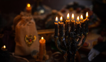 Magic scene, Mystical atmosphere, view of candles on the table, esoteric concept, fortune telling and predictions