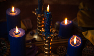Magic scene, Mystical atmosphere, view of candles on the table, esoteric concept, fortune telling and predictions