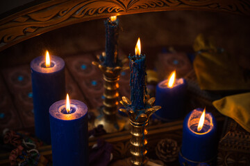 Magic scene, Mystical atmosphere, view of candles on the table, esoteric concept, fortune telling and predictions