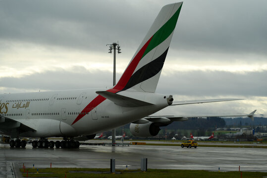 Emirates Airline Airbus A380 register A6-EOZ taxiing at Zürich Airport on a rainy winter afternoon. Photo taken December 26th, 2021, Zurich, Switzerland.