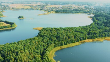 Slobodka, Braslaw District, Vitebsk Voblast, Belarus. Aerial View Of Potsekh Lake Near Slobodka Village. Church of Divine Providence - obrazy, fototapety, plakaty