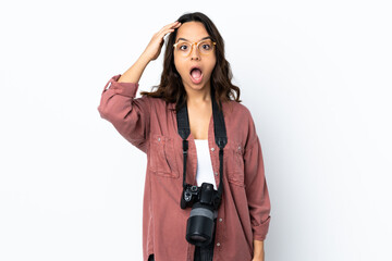 Young photographer woman over isolated white background has realized something and intending the solution