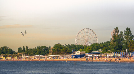 Crowd on city sandy beach in Anapa, Russia
