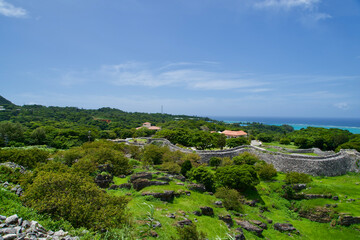 Fototapeta na wymiar The view of nature and stone wall at Nakijin castle in Okinawa.