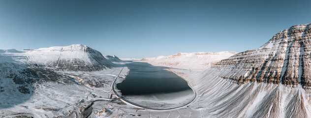 Aerial Drone Panorama view of Westfjords mountains in Icealand. Blue sky in the Westfjords region...