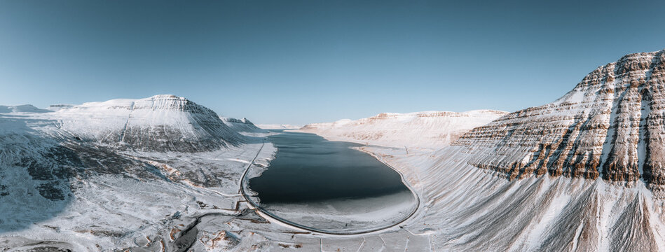 Aerial Drone Panorama view of Westfjords mountains in Icealand. Blue sky in the Westfjords region in Iceland. Nature landscape from above.