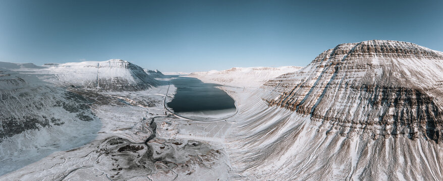 Aerial Drone Panorama view of Westfjords mountains in Icealand. Blue sky in the Westfjords region in Iceland. Nature landscape from above.
