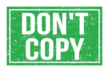 DON'T COPY, words on green rectangle stamp sign