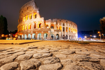 Fototapeta na wymiar Rome, Italy. Colosseum Also Known As Flavian Amphitheatre In Night