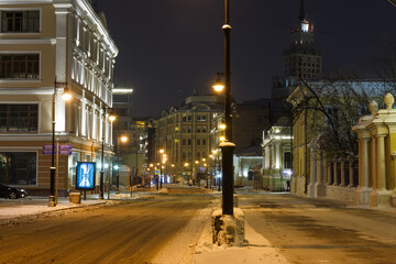 Fototapeta na wymiar Moscow, Russia, Dec 21, 2021: Night view of Myasnitskaya street (direction to Krasnye Vorota square). Snow