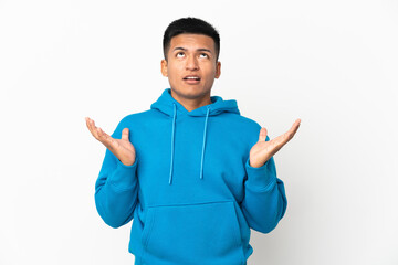 Young Ecuadorian man isolated on white background stressed overwhelmed