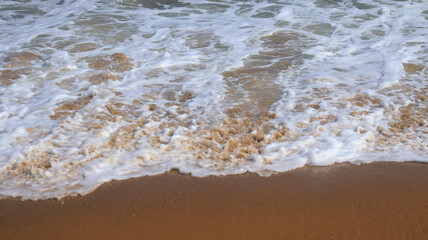 beautiful beach and sea waves and white foam