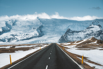 Street Highway Ring road No.1 in Iceland, with view towards massive glacier. Southern side if the...