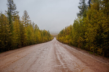 Fototapeta na wymiar Old gravel road in the Irkutsk region
