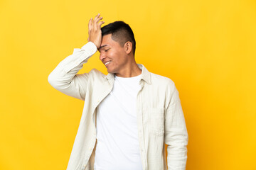 Young Ecuadorian man isolated on yellow background has realized something and intending the solution