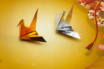 Gold and silver festive paper cranes