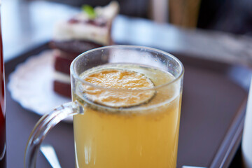 Tangerine ade, coffee and red velvet cake in the beach cafe