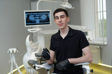 Young medical specialist dentist in modern hospital. Dental healthcare treatment specialist.