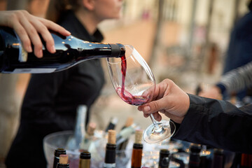 serving wine in a glass