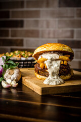 Perfect Burger Classic Bacon Homemade Artisan Tomato Sauce Sausage Melted Cheese Milk Shake Onion Chicken Meat Pasta Shrimp Restaurant Menu Gourmet on a wooden table