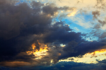 Light beam with dark clouds . Fantastic evening heaven 