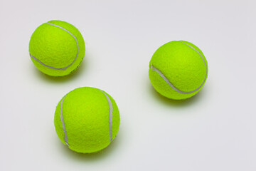 tennis ball lies on a white background