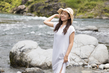 Girl playing in the river