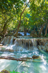 Erawan National Park  in Thailand. Erawan Waterfall is a popular tourist destination and famous for its emerald blue water. Deep forest in tropical climate with fantasy atmosphere. 