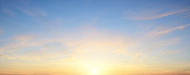 Clear blue sky. glowing pink and golden cirrus and cumulus clouds after storm, soft sunlight. Dramatic sunset cloudscape. Meteorology, heaven, peace, graphic resources, picturesque panoramic scenery - 477747662