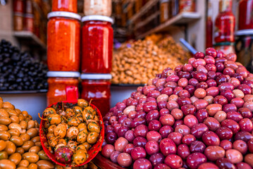 Pile of Olea europaea or Olive for sale at local street bazaar in Marrakech