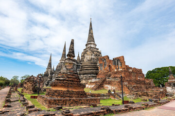 Fototapeta premium Wat Phra Sri Sanphet Temple site, ruins of majestic royal palace temple with 3 restored towers in the old capital of Thailand, Ayutthaya.